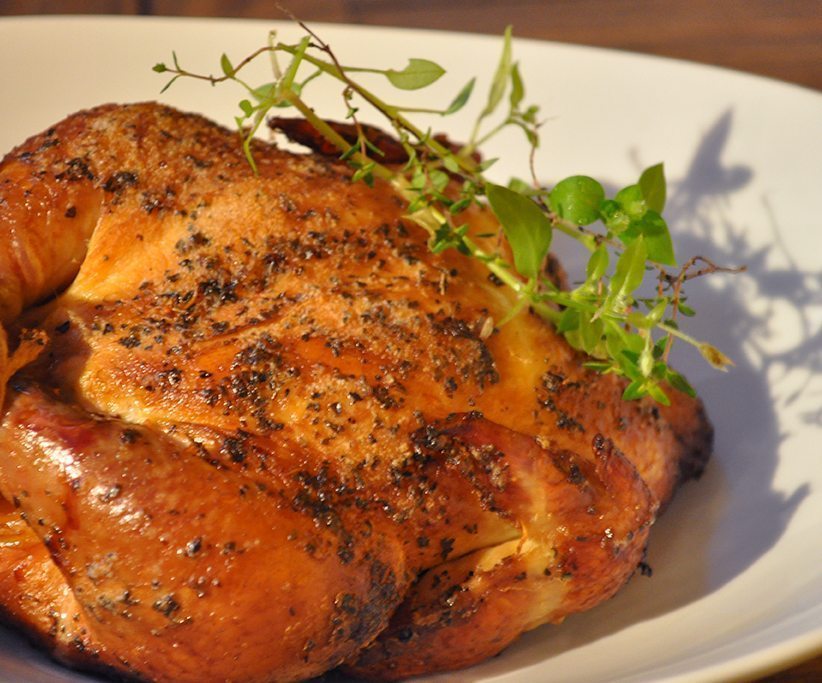 Plate of smoked Cornish game hen